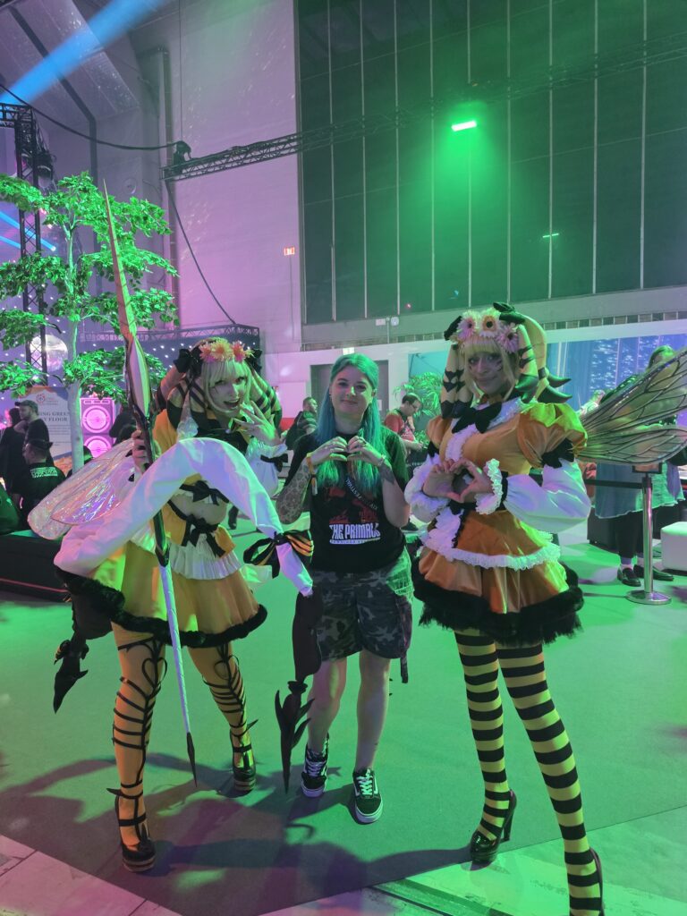 Meg Pelliccio with two cosplayers as Honey B Lovely at Final Fantasy XIV Fan Festival in Berlin.